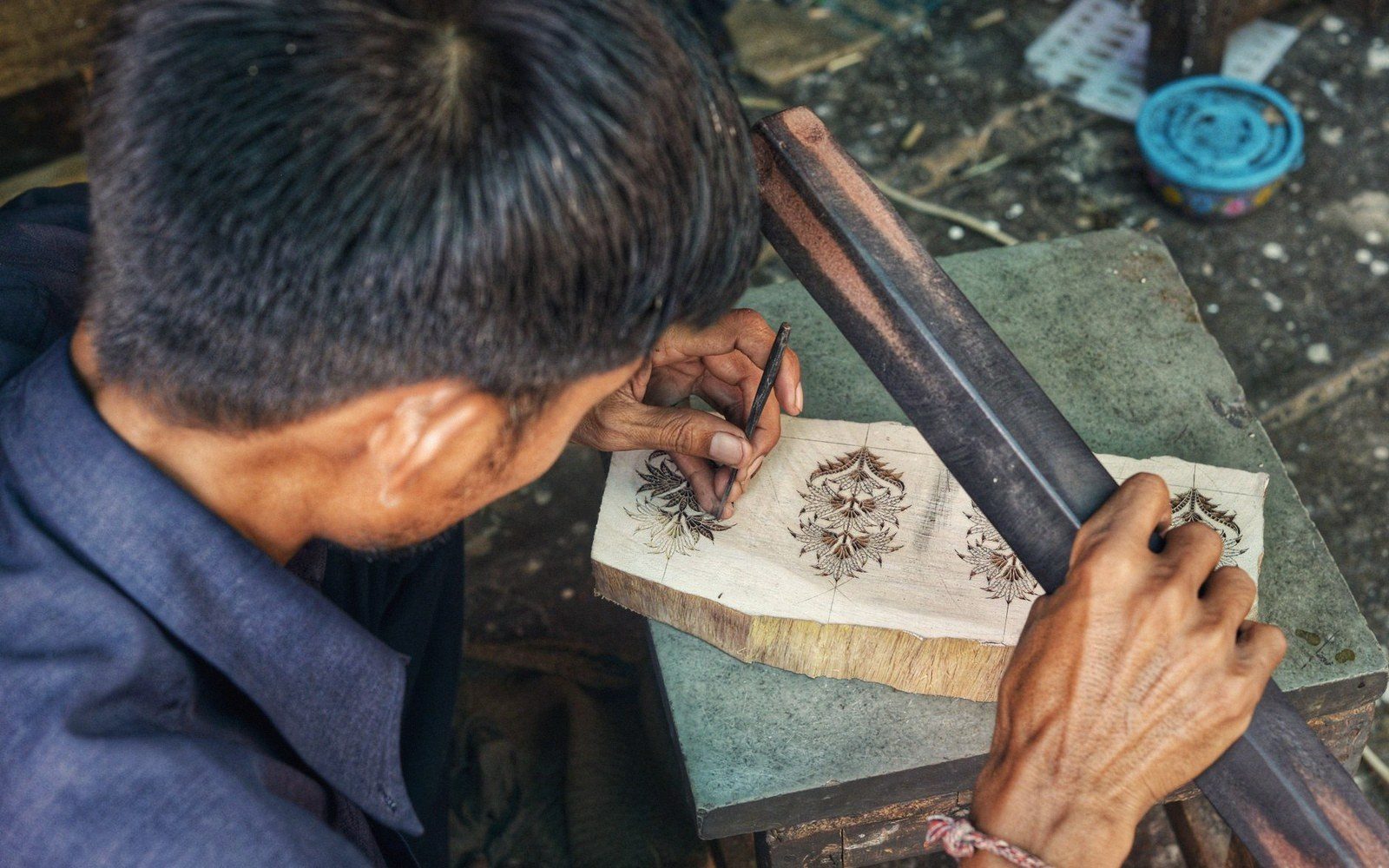 A rack of carved wooden printing blocks